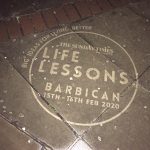 Circular clean advertising reverse graffiti stencil for The Sunday Times 'Life Lessons' festival, cleaned into the pavement outside the Barbican Centre in London.